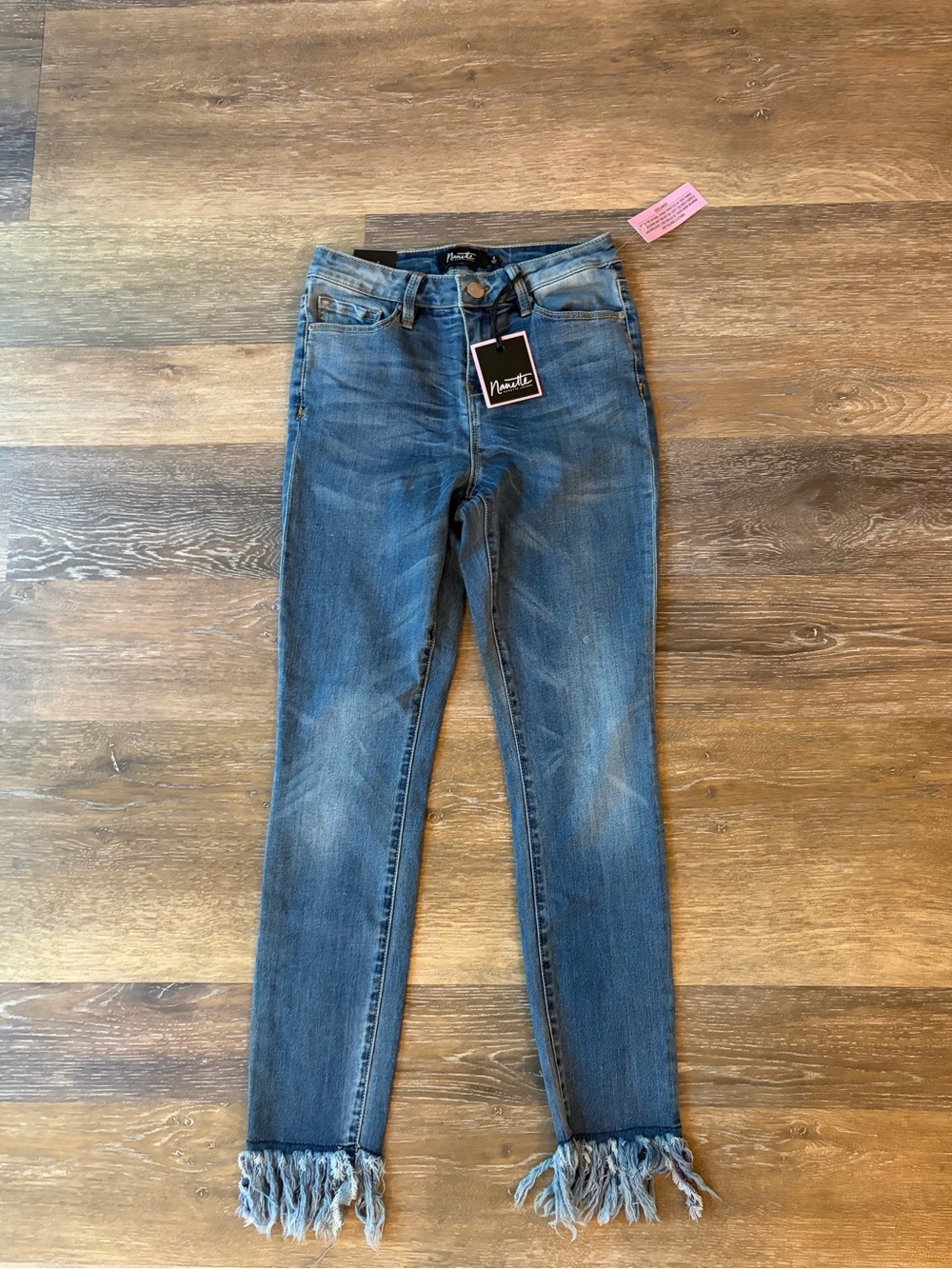 NWT Nanette Lepore high-rise skinny jeans with an exaggerated fringe hem size 4